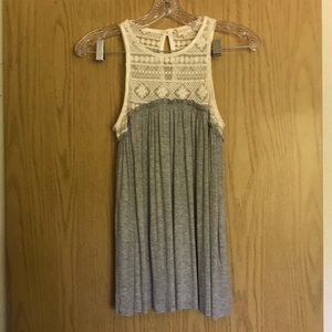 Cream and grey sleeveless top